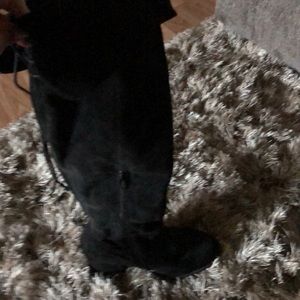 Black tall boots